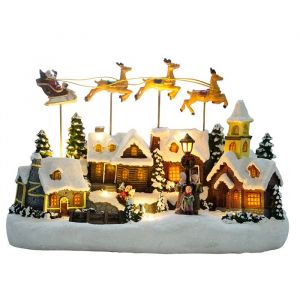 Village de No&euml;l avec tra&icirc;neau volant - anim&eacute; &agrave; piles et lumineux