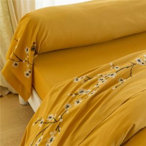 Drap plat en coton imprimé motifs feuilles jaune ocre ILE SACREE