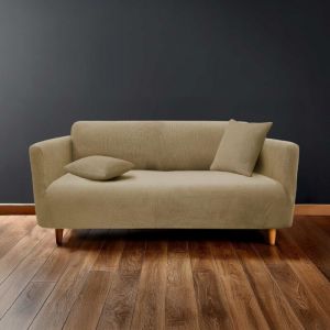 Housse de canap&eacute; extensible en polyester gaufr&eacute; coloris beige