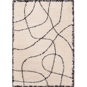 The Deco Factory FICELLE - Tapis salon shaggy à poils long graphiques crème et noir 200x290