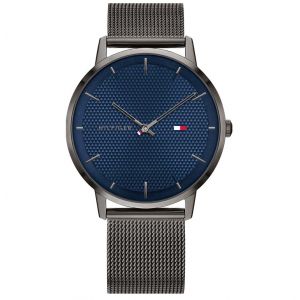 Tommy Hilfiger Montre 1791656 - boitier acier plaqu&eacute; ionique gris rond cadran bleu bracelet acier maille milanaise canon de fusil Homme