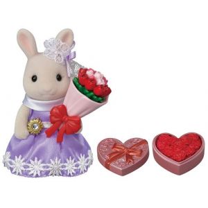 Epoch Sylvanian - La grande soeur lapin crème et son bouquet de fleurs