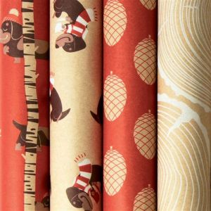 Image de Clairefontaine Lot de 3 gros rouleaux papier cadeau 10m Noël enfant + 2 bolducs blanc et rouge