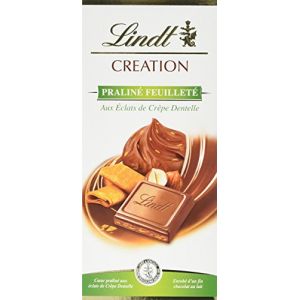 Lindt Chocolat au lait, extra-fin, fourré aux pralinés amandes et noisettes, aux éclats de Crêpe Dentelle - Le paquet de 150g