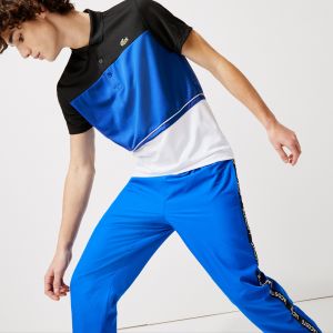 Lacoste Polo Sport en piqué respirant color-block avec marquage Taille XS Noir/bleu/blanc