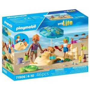 Playmobil Famille jouant dans le sable à la plage