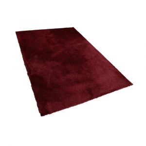 Beliani Tapis 140 x 200 cm rouge EVREN - noir