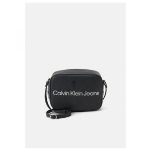Calvin Klein Jeans pour femme. Sac ? bandouli?re avec logo noir