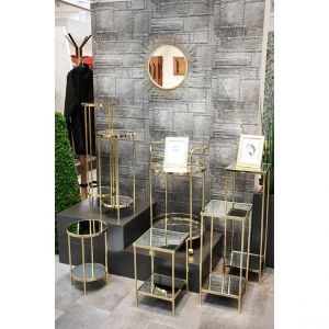 Desserte en métal laitonné et tablettes en verre miroir