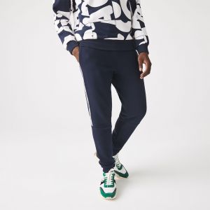 Lacoste Pantalon de jogging fuselé en molleton avec bandes siglées Taille XL Bleu Marine