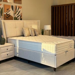 Milia - Lit coffre en tissu beige 180x200 cm