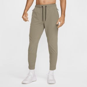 Image de Nike Pantalon avec ouvertures &agrave; zip Dri-FIT Unlimited pour homme - Vert - Taille L - Male