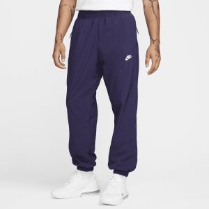 Nike Pantalon d‘hiver tissé Windrunner pour homme - Pourpre - Taille L - Male