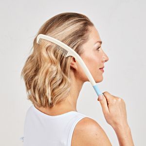 Peigne à long manche