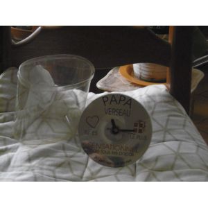 horloge pendulette forme CD fond argenté signe VERSEAU - Occasion