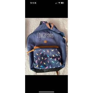 Parfait état sac à dos de cours longboard ados bleu plumes - Occasion