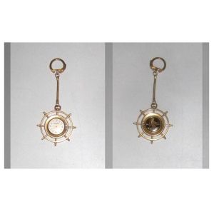 MONTRE ESPERANTO EN PORTE CLE EN GOUVERNAIL BATEAU MARINE AIGUILLE MECANISME AUTOMATIC A REMONTERMETALLIQUE DORE COULEUR ORDORE SANSBESOIN DE PILE PUBLIC MIXTE HOMME ET FEMME BIJOU UTILE - Occasion