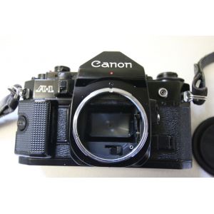 Canon A-1 + Objectif canon 35/105 + Flash speedlte 199A - Occasion