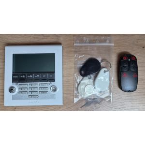 Lot : Clavier LCD + 5 badges + T&eacute;l&eacute;commande ON/OFF + zones alarme (pour Alarme Somfy Protexiom) - Occasion