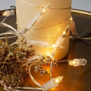 Hellum Guirlande lumineuse intérieure alimentée en courant, mini guirlande lumineuse 10, lumières chaudes claires, éclairées 1,35m, câble transparent,10 lumières avec fiche pour Noël < 59 lm 831191 (Hellum Direkt, neuf)