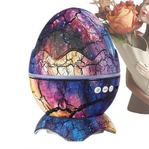 JIEBWCHA Projecteur Galaxie, 16x11cm Projecteur De Ciels &Eacute;toil&eacute; LED Lampe Galaxie, Lumi&egrave;re Du Ciels &Eacute;toil&eacute; En Forme D'&oelig;uf De Dinosaure Avec Lecteur De Musique Sans Fil, 16 Effets Sonores (nichun, neuf)