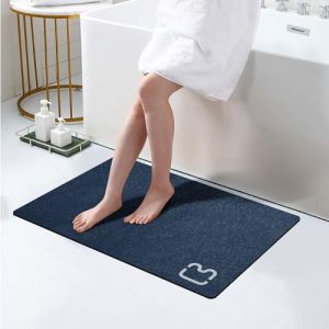 Omulla Tapis de salle de bain en pierre de diatomite – Tapis fin en caoutchouc antidérapant à séchage rapide, super absorbant, pour salle de bain, salle douche, buanderie, évier, 43,2 x 69,8 cm, bleu (ningbajqqW, neuf)