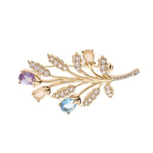 Broche en plaqué or motif feuillage avec oxydes couleurs pastels et blancs sertis