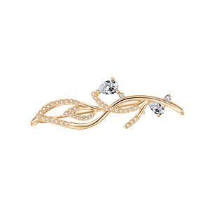 Broche en plaqué or motif avec rail d'oxydes blancs et oxydes blancs sertis 4.4X0.9 cm