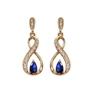 Boucles d'oreilles pendantes en plaqué or collection joaillerie torsade avec demi-rail d'oxydes blancs et oxyde bleu et fermoir poussette