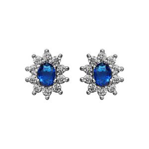 Boucles d'oreilles en argent rhodié collection joaillerie pierre centrale bleu foncé contour oxydes blancs sertis et fermoir poussette