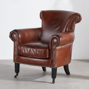 Fauteuil en cuir marron effet vieilli