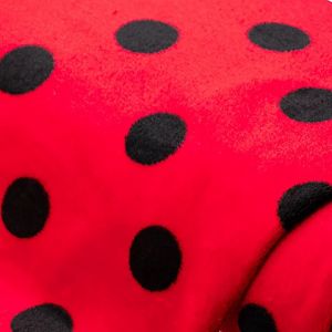 Tissu polaire "pois coccinelle", rouge/noir, série "Wellness"