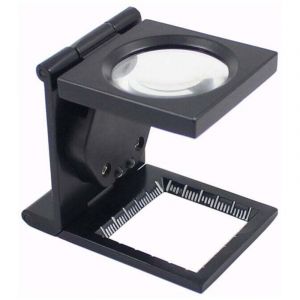 Loupe compte-fils pliable avec monture en métal laqué noir