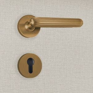 Poign&eacute;e de porte design &agrave; cylindre finition aspect bronze Tina - KATCHMEE