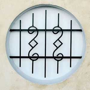 Grille de Defense Nectra diametre 80 cm pour Fenetre ronde (côte tableau)