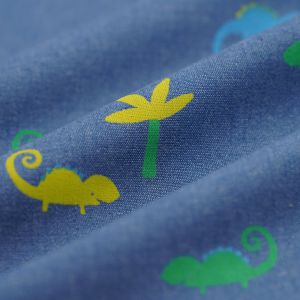 Tissu chambray caméléon palmier bleu - Mondial Tissus