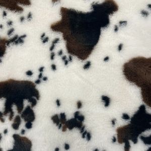 Tissu fausse fourrure douce &eacute;cru motif vache cow boy - DOMOTEX - Mondial Tissus