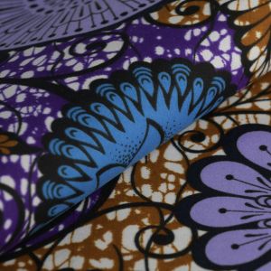 Tissu Wax rond fleuri ocre parme - Mondial Tissus