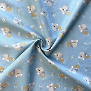 Tissu cretonne coton bleu ciel motif koalas endormis - DOMOTEX - Mondial Tissus