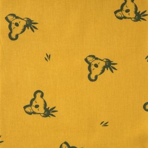 Tissu Cretonne Coton motif koala branche moutarde - DOMOTEX - Mondial Tissus