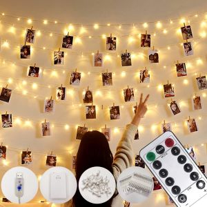 KALANKA-Guirlande Photo,10M100LED 8Modes,Aliment&eacute; par USB ou Batterie,avec T&eacute;l&eacute;commande,Lumineuse LED d'int&eacute;rieur pour Chambre Photo Suspendre des Photos,D&eacute;coration de Chambre (50Clips 25Clous) - Neuf