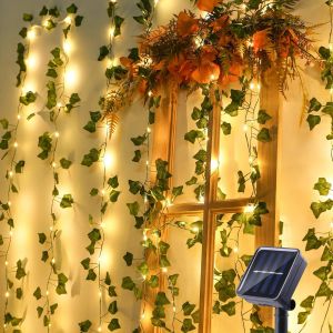 KAL-Guirlande Lumineuse Solaire Extérieure, 12M 100 Led Lierre Artificiel Guirlande Solaire 8 Modes Étanche Lumiere Pour Jardin Balcon Patio Chambre Mariage Fête Noël Décoration, Blanc Chaud - Neuf