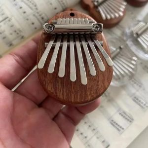 Mini Piano à Pouce en Bois,Jouet Musical 8 Tons,Portable,pour Débutants,Boîte à Musique,Bricolage,Cadeaux de Noël,Cadeau pour Petite Amie,1 Pièce -Water droplet - Neuf