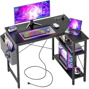 SUBZONAL-Bureau d&iquest;Angle avec Multiprise et &Eacute;tag&egrave;res, 100 x 70 cm Bureau Gaming Informatique Petit Mod&egrave;le avec Rangement Lat&eacute;ral, Table d&iquest;Ordinateur Forme L R&eacute;versible pour Travail et &Eacute;tudes, Noir - Neuf