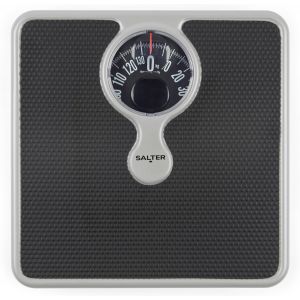 KALANKA-P&egrave;se-Personne M&eacute;canique, Loupe Grossissante, Capacit&eacute; 133kg, Design &Eacute;l&eacute;gant et Compact, Cadran Facile &agrave; Lire, Argent/Noir, Sans Pile, P&egrave;se-Personne Robuste et Pratique &agrave; Utiliser - Neuf