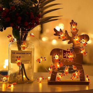 TRAHOO-Guirlande lumineuse d'int&eacute;rieur &agrave; piles - Motif renne - 2 m - 20 LED - D&eacute;coration de No&euml;l - Rideau lumineux ext&eacute;rieur - Blanc chaud - Renne &eacute;clair&eacute; &agrave; l'ext&eacute;rieur - Piles pour f&ecirc;te - Neuf