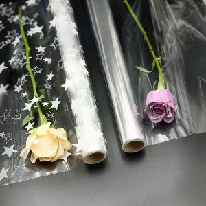 Rouleau De Cellophane Pour Emballage Cadeau: Lot De 2 Emballages En Cellophane De No&euml;l 3 M X 80 Cm Transparent Et Motif &Eacute;toile Pour Paniers De Fleurs - Neuf