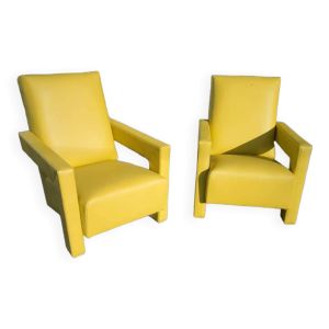 Paire de fauteuils en cuir jaune soleil