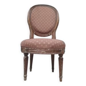 Chaise basse de style Louis XVI