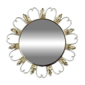 Miroir rond sur cadre laiton à volutes